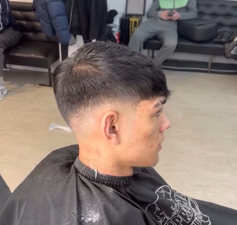 Modern textured haircut by AC Trimz
